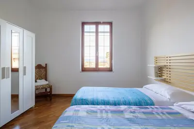 Letto o letti in una camera di Appartamento Roberta-5 beds,AC