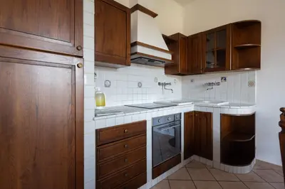 Cucina o angolo cottura di Appartamento Roberta-5 beds,AC