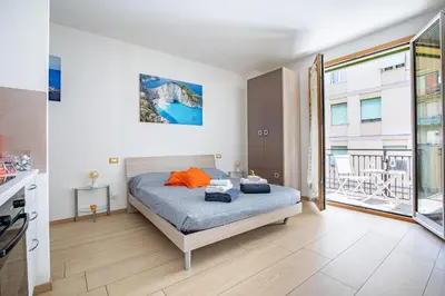 Letto o letti in una camera di Orizzonte 5 Terre - Via Lunigiana 221 - Stazione Migliarina, interno 18