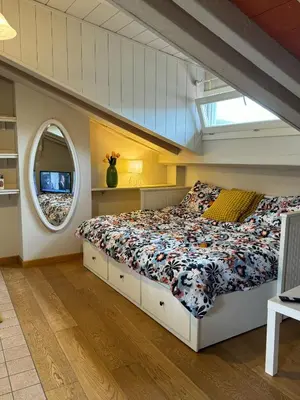 Letto o letti in una camera di La casa sui tetti di Varzi