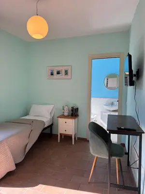 Letto o letti in una camera di La casa sui tetti di Varzi