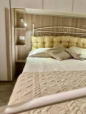 Letto o letti in una camera di L'Angolo Tranquillo
