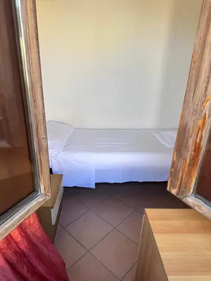 Letto o letti in una camera di Dante 11 Flat