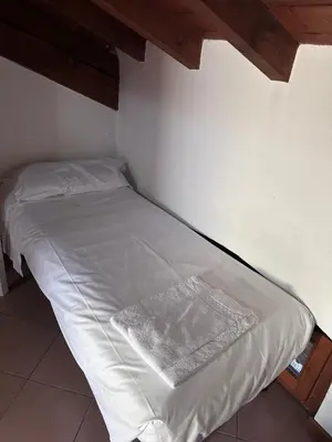 Letto o letti in una camera di Dante 11 Flat
