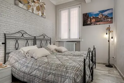 Letto o letti in una camera di Bici gratis e Wi-Fi a 5 Min dal Ducale