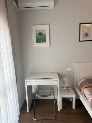 Letto o letti in una camera di WELCOME RIVIERA-Castagneto 29