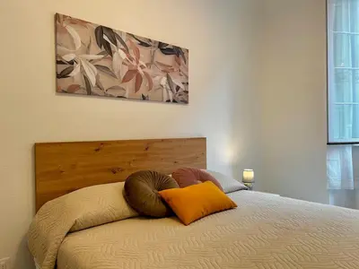 Letto o letti in una camera di Remolari, Two-room apartment in the historic center