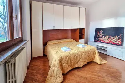Letto o letti in una camera di Family House - Crema