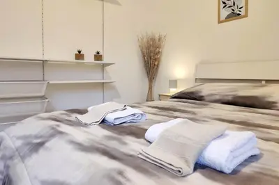 Letto o letti in una camera di Santa Caterina 3 - San Bernardo
