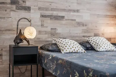 Letto o letti in una camera di La Casa di Parma - Strategic Location