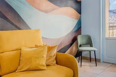 Area soggiorno di Casa Mameli in The Heart of City