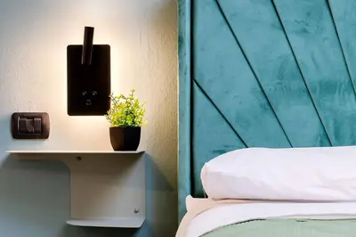 Letto o letti in una camera di Casa Mameli in The Heart of City