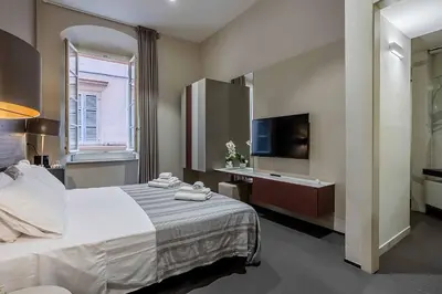 Letto o letti in una camera di Salina Luxury Suites