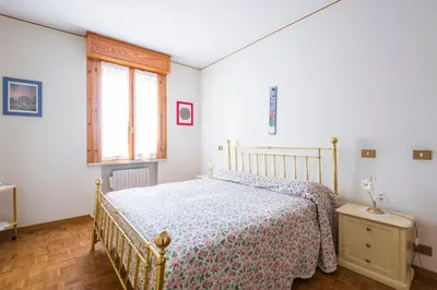 Letto o letti in una camera di Il Melograno, appartamento privato