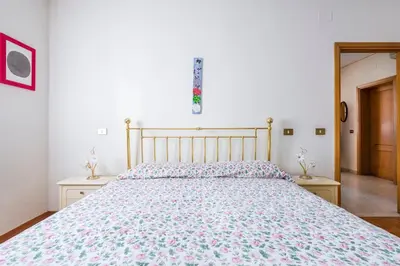 Letto o letti in una camera di Il Melograno, appartamento privato