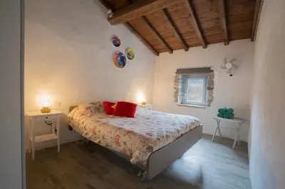 Letto o letti in una camera di Le Case di Rosie, Unique Stay & Pool