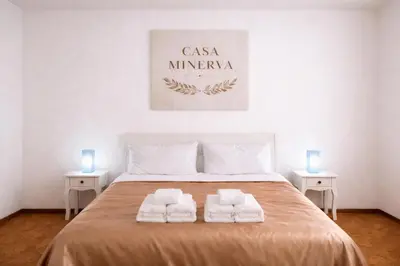 Letto o letti in una camera di Casa Minerva centro - vicino CNAO,San Matteo,Maugeri,Mondino