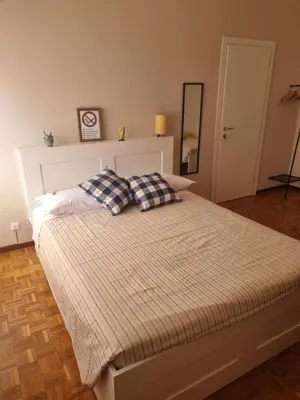 Letto o letti in una camera di Casa Fenice