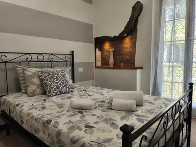 Letto o letti in una camera di L'Eden