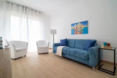 Area soggiorno di Sirius Apartment - Affitti Brevi Italia