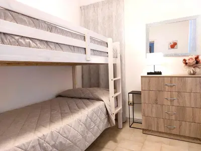 Letto o letti in una camera di Azzurria