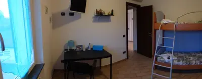 Letto o letti in una camera di B&B Podere Montese