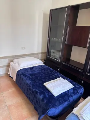Letto o letti in una camera di Soldi 17 Cremona Stadio