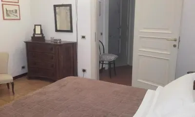 Letto o letti in una camera di Appartamento Giardino Verde