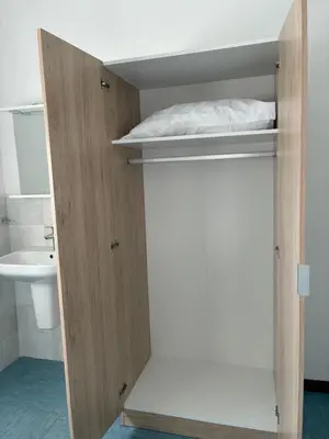 Letto o letti in una camera di Hotel Riccò