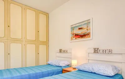 Letto o letti in una camera di Casa Drago