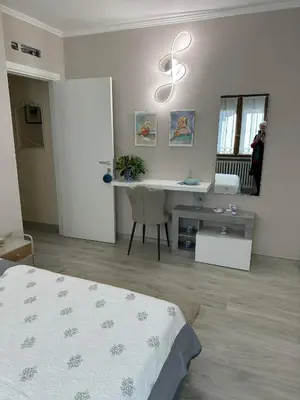 Letto o letti in una camera di Casa Vacanze Il Glicine