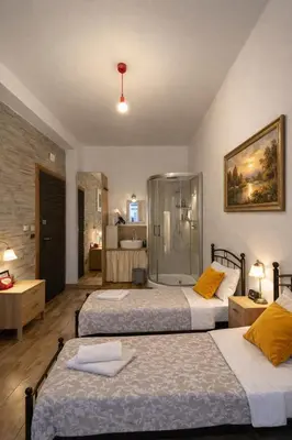 Letto o letti in una camera di Parma Station Rooms