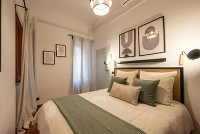 Letto o letti in una camera di Rapallo City Center Steps from the Sea AC Wi-Fi Parking