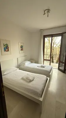 Letto o letti in una camera di Casa Angela