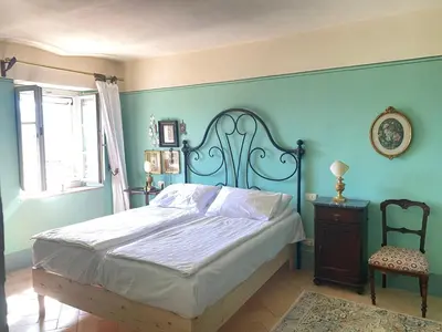 Letto o letti in una camera di Casa Rosmarino Malgrate
