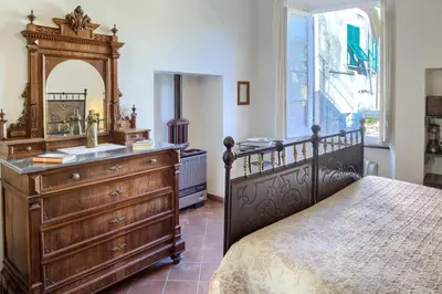 Letto o letti in una camera di Chiara House