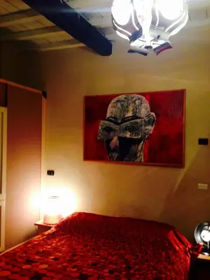 Letto o letti in una camera di Mood-Siro Comi