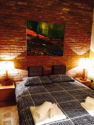 Letto o letti in una camera di Mood-Siro Comi