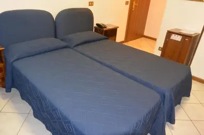 Letto o letti in una camera di Hotel Italia City Center