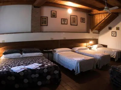 Letto o letti in una camera di Locanda Casa Motta