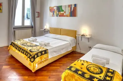 Letto o letti in una camera di Raffaella House