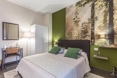 Letto o letti in una camera di B&b Igea 50