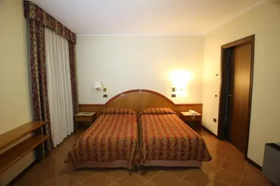 Letto o letti in una camera di Hotel Paris