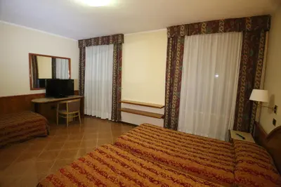 Letto o letti in una camera di Hotel Paris