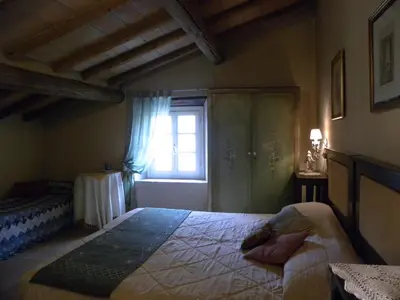 Letto o letti in una camera di Agriturismo Il Gelso