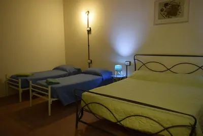 Letto o letti in una camera di Ostello Castello Mina Della Scala