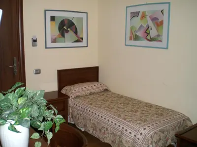Letto o letti in una camera di Hotel San Giorgio