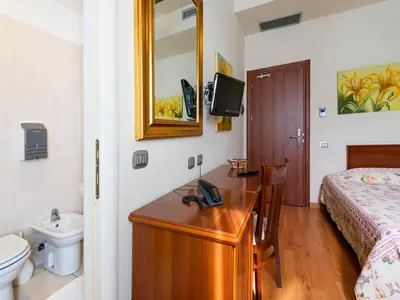 Letto o letti in una camera di Hotel San Giorgio