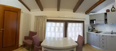 Cucina o angolo cottura di La Baita D'Oro Ristorante Residence