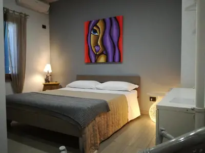 Letto o letti in una camera di La Fenice